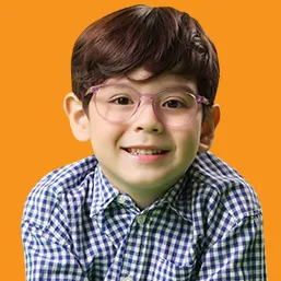 A young kids wearing glasses and a checkered shirt