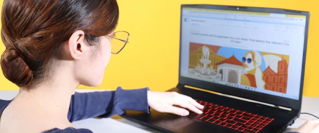 anti-rad woman wearing glasses using laptop A