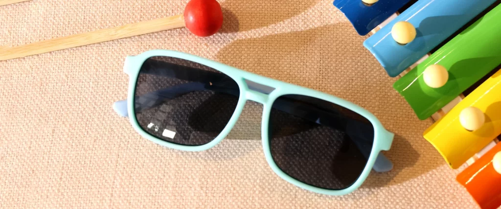 EO Blaze Kids sunglasses with toys as decoration